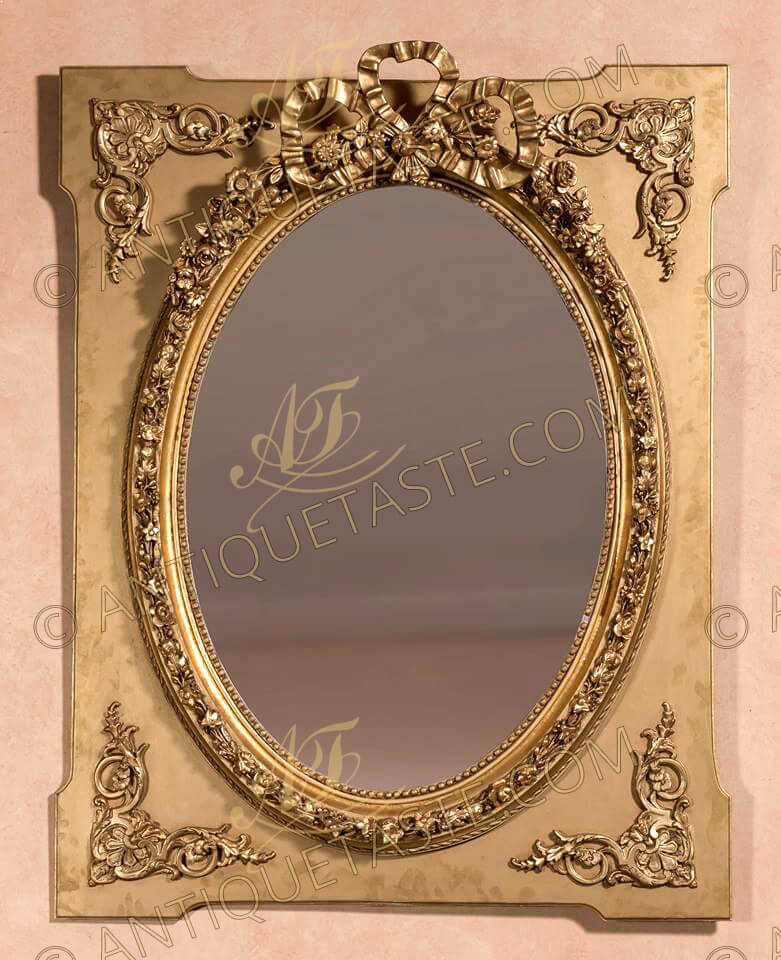 French 19th century Louis XVI Neoclassical style parcel gilt and creamy blanc de plomb finish oval and re-entrant mirror frame